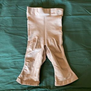 SKIMS shapewear shorts in color Sienna. Never used, no tags.